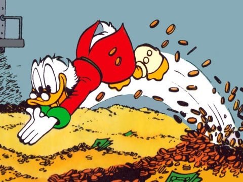 Dagobert Duck springt in seinen Geldbunker